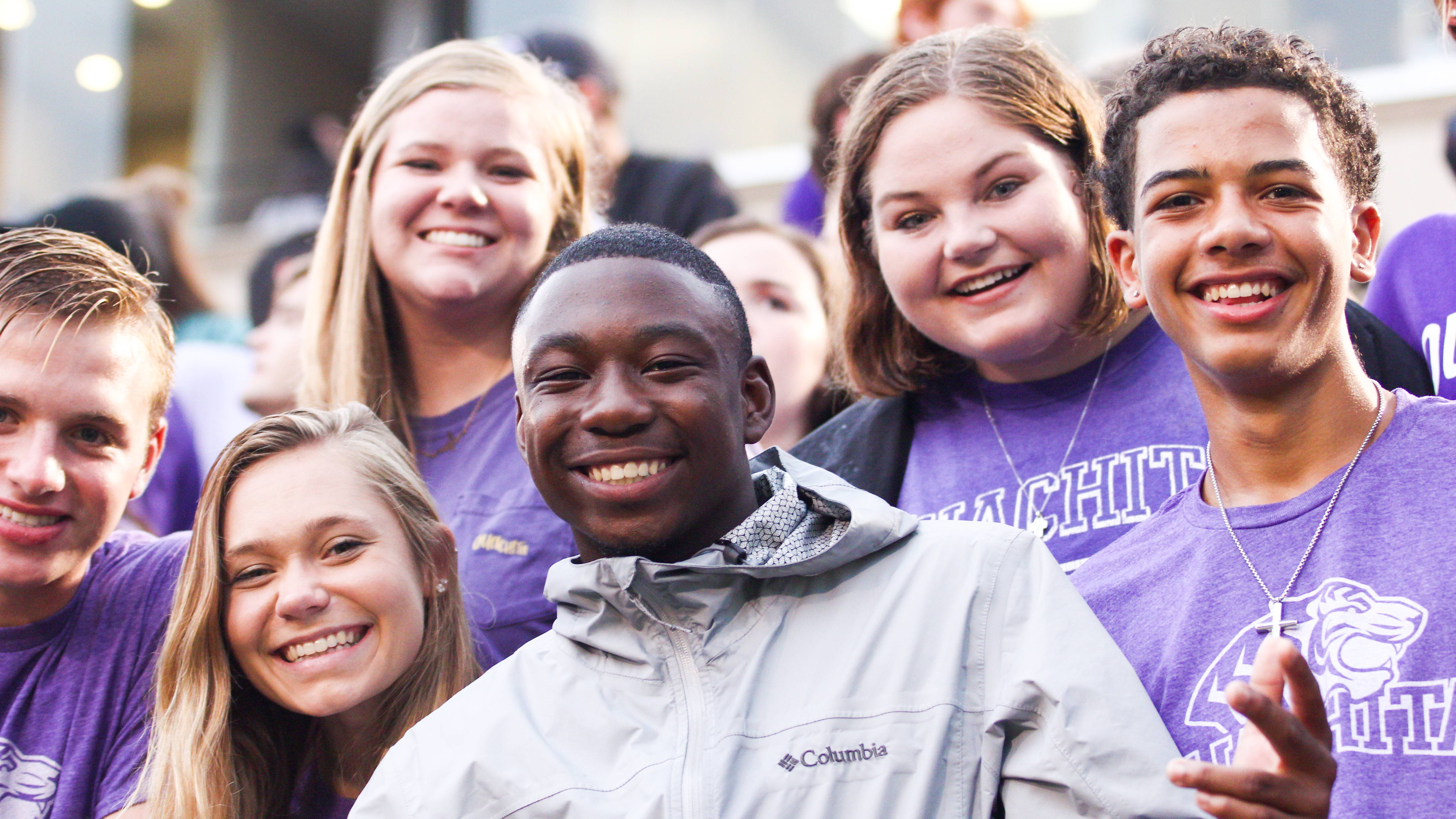 Students in football stands